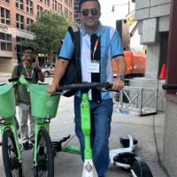 International Student on the scooter